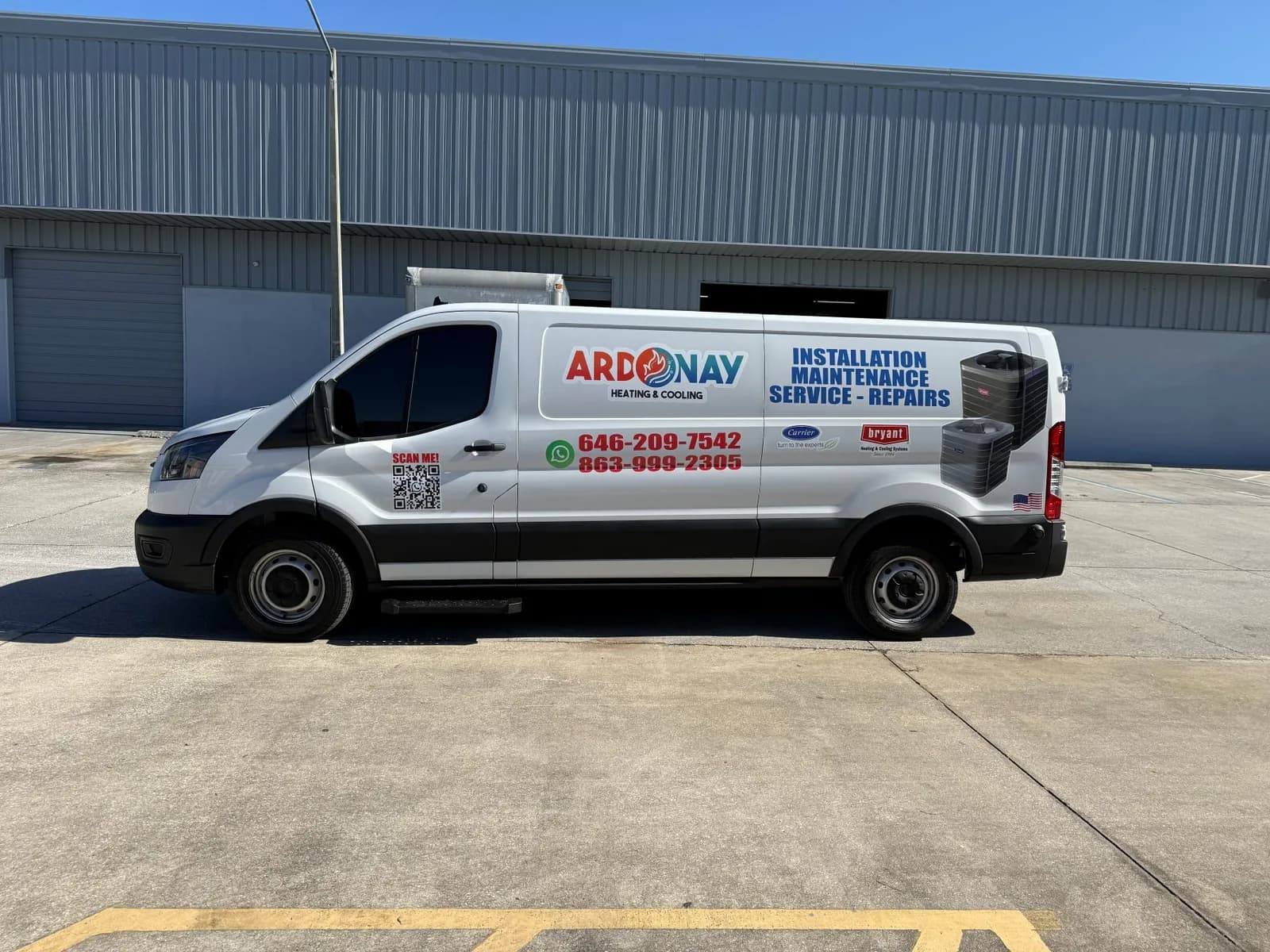 Work van with logo and contact lettering